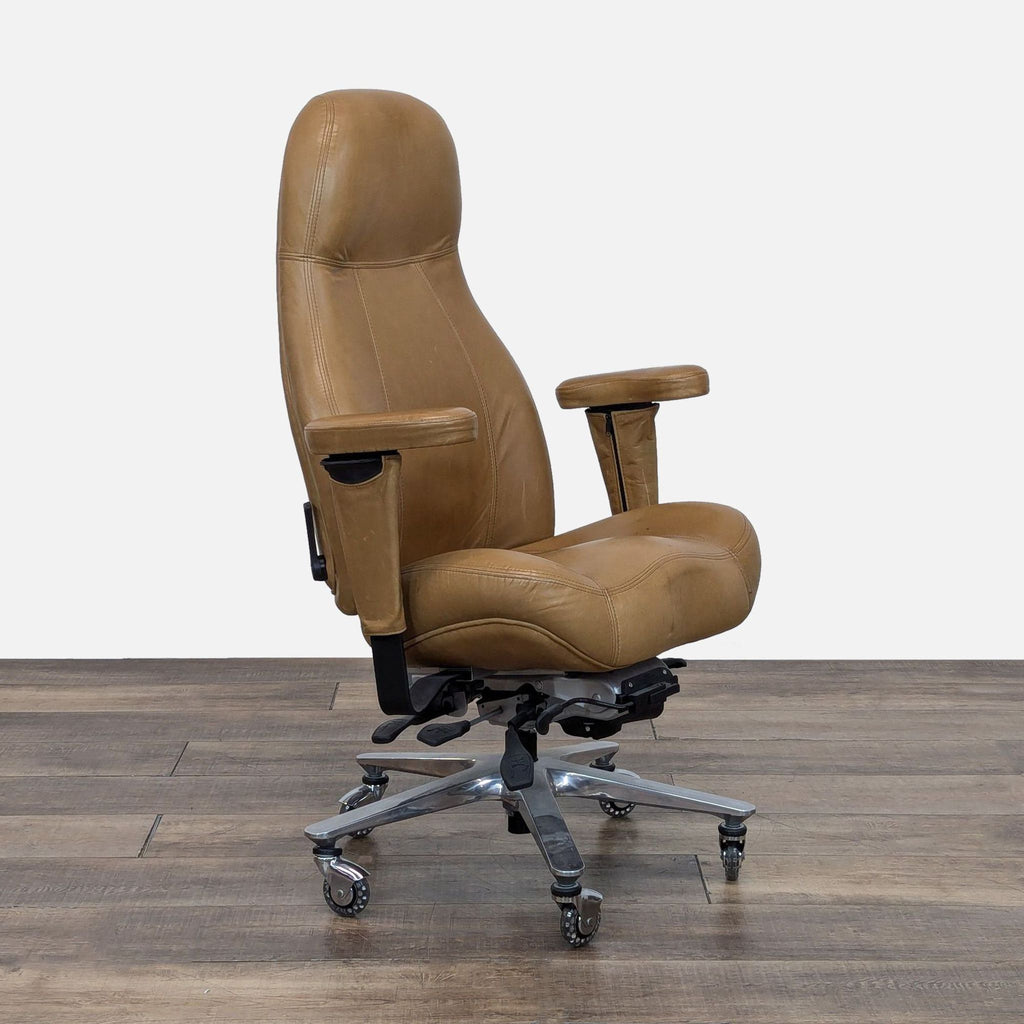 Angled view of ergonomic office chair with contoured seating and lumbar support.