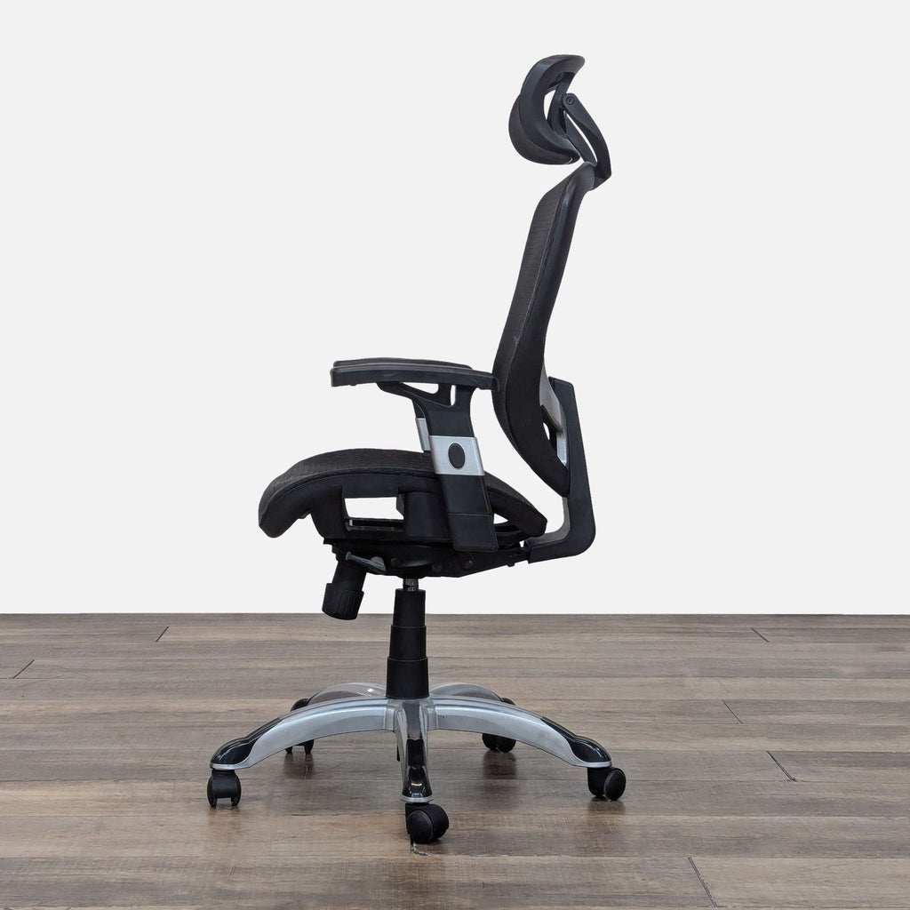 Side view of a Staples chair featuring adjustable height and tilt.