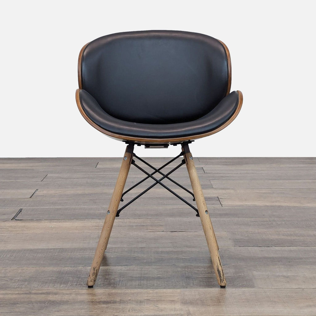 Bentwood chair with leather upholstery, wooden legs, metal stretchers.