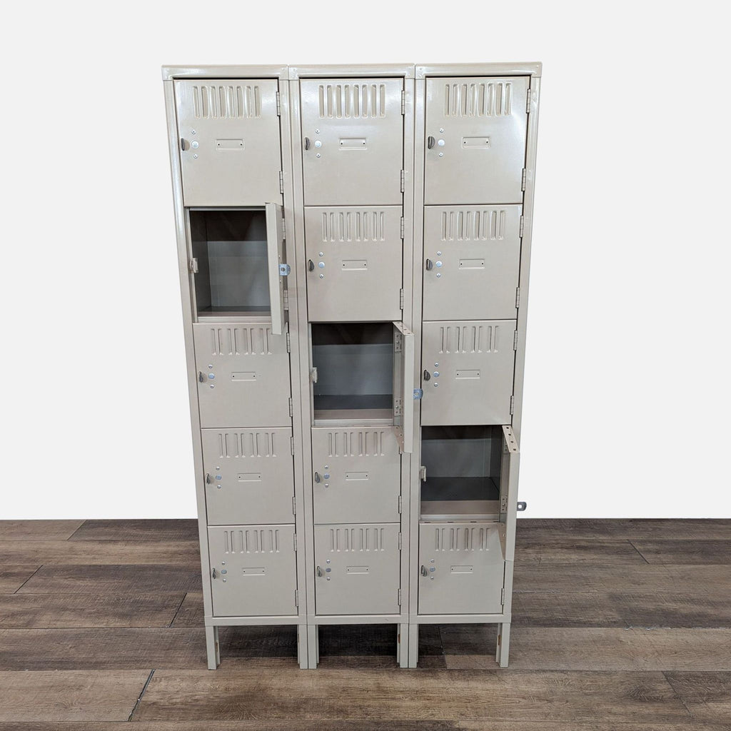 Front view of Tennsco lockers, showing open and closed doors on a 5-tier, 3-unit setup.  
