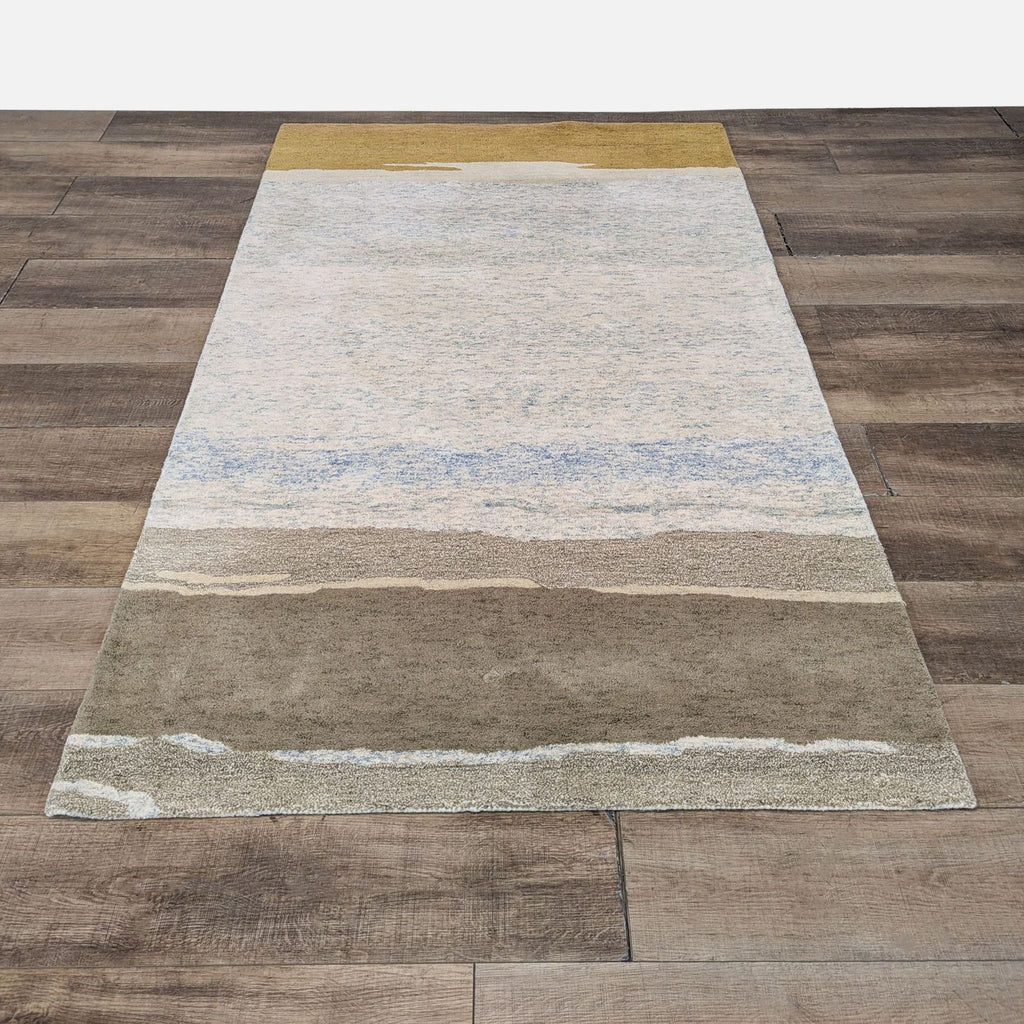 Nature-inspired Meadow rug with earthy tones, hand-woven wool design on wooden floor.