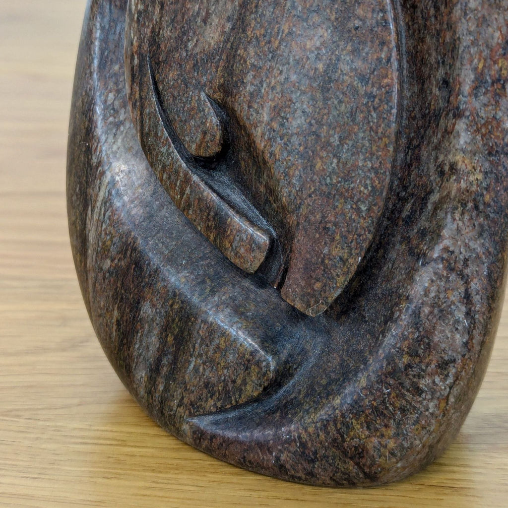 Close-up of the Mutare Serpentine sculpture's intricate abstract detailing.