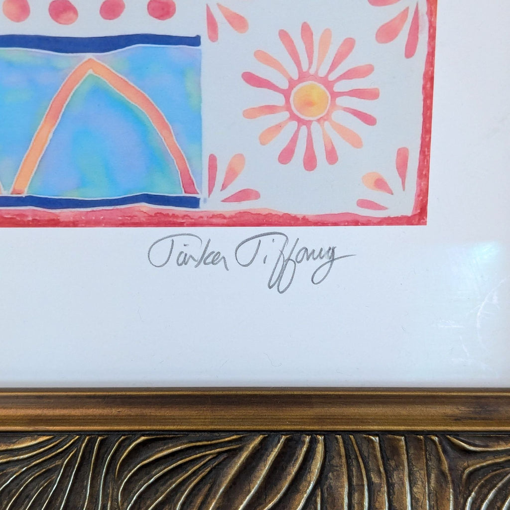 Close-up of the artist's signature in pencil on the tropical print.