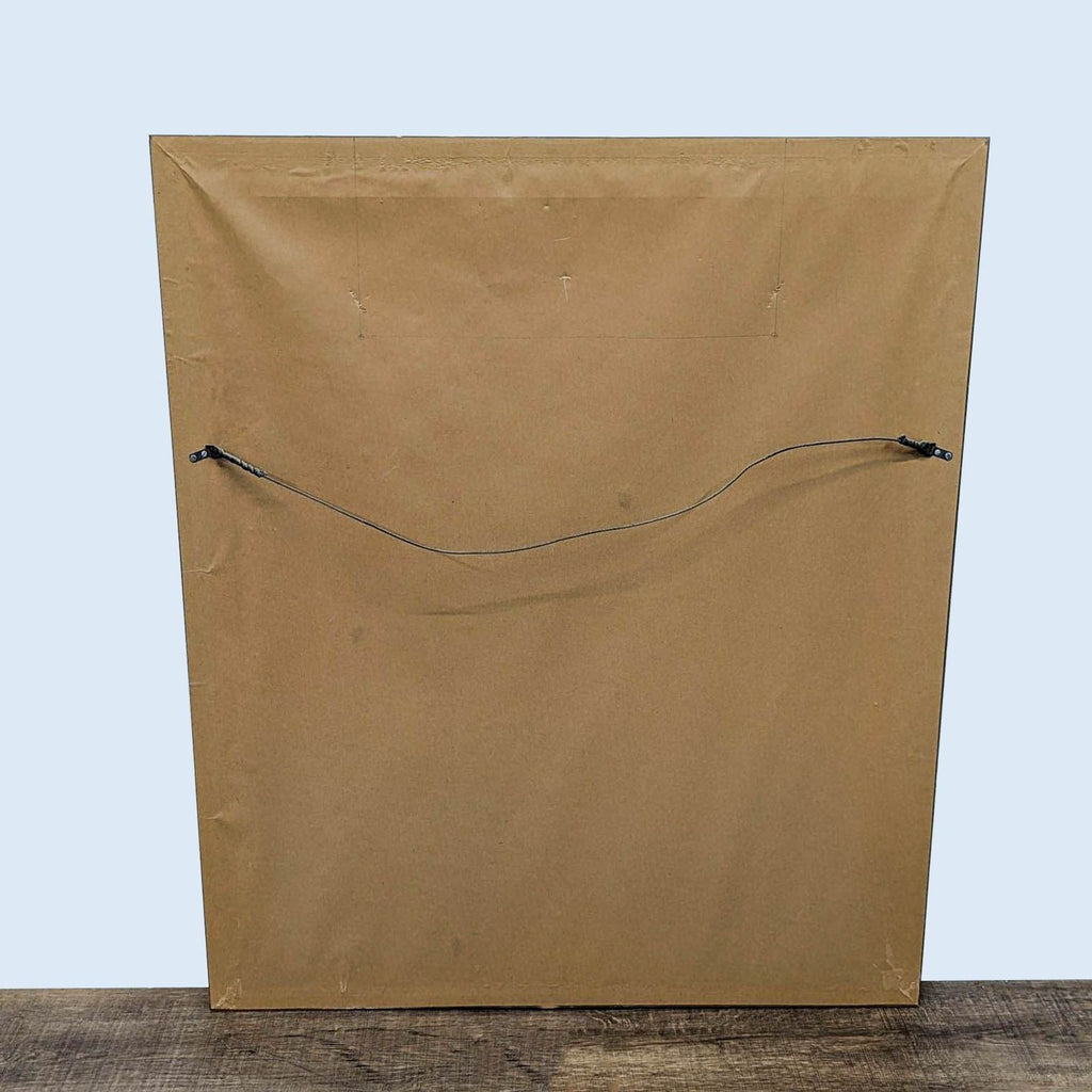 Back view of Reperch mirror showing a sturdy wire for hanging.