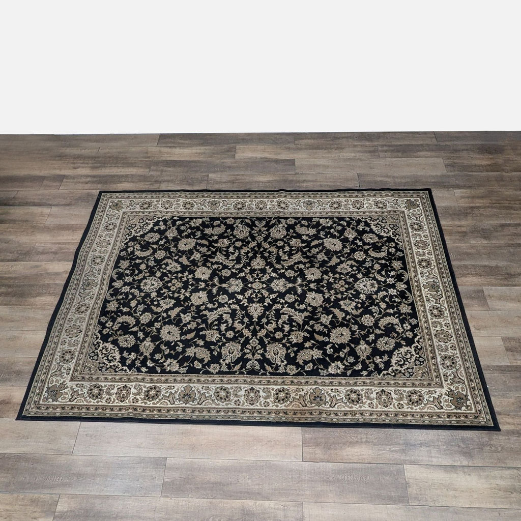 Italian-made Kashan Black rug with intricate floral design, styled on a wooden floor.