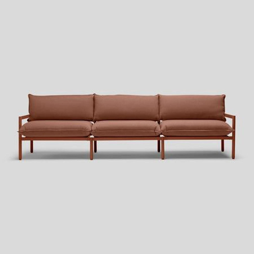 Putty-colored outdoor sofa with aluminum frame and recycled fabric, front view.