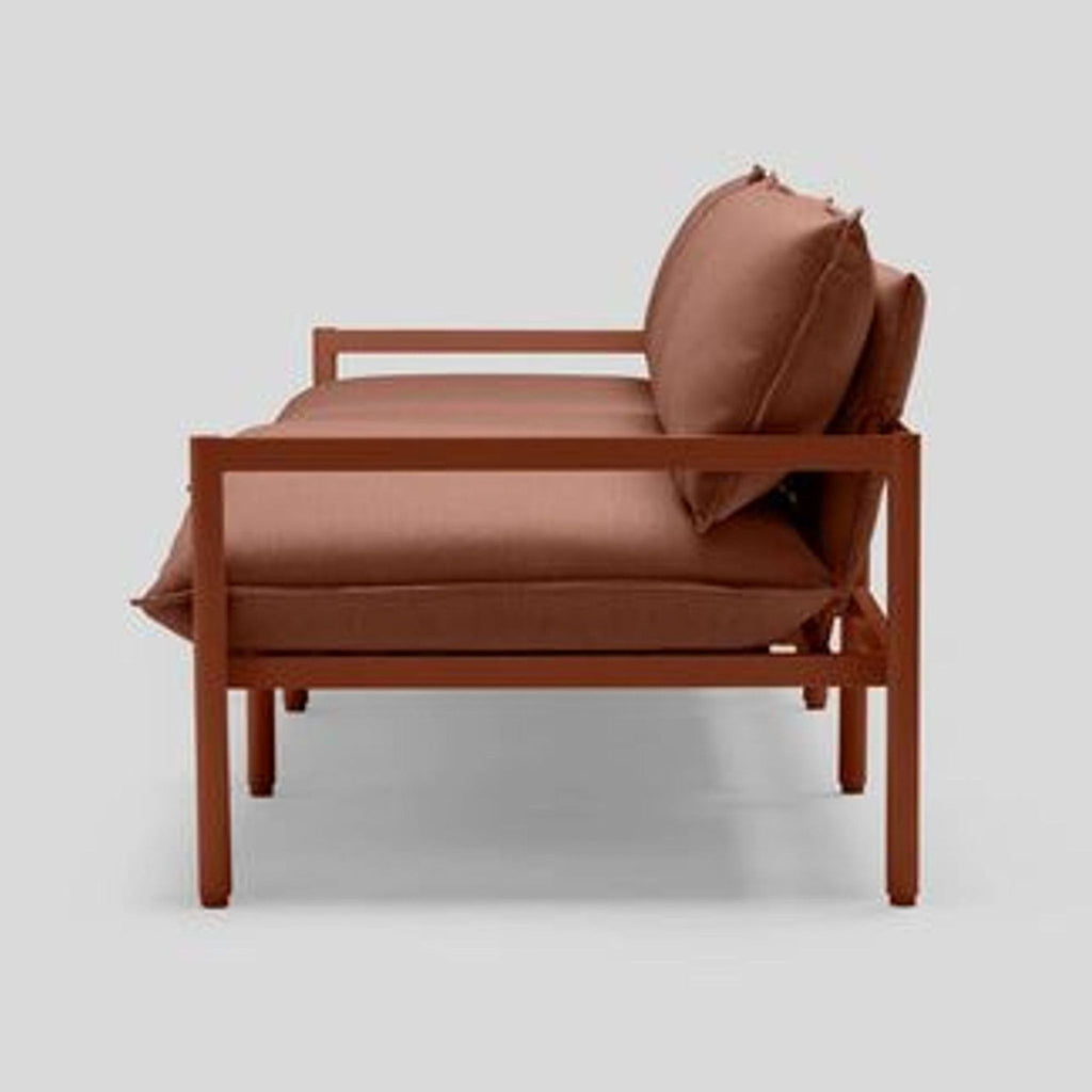 Side view of the Terra outdoor sofa, showcasing its sturdy frame and cushions.