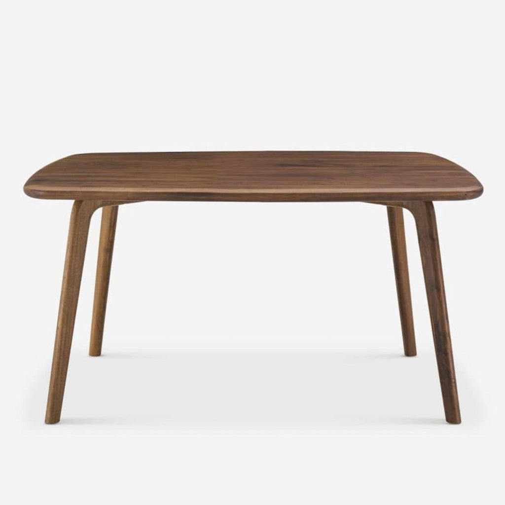 Solid American walnut dining table by Castlery, showcasing simple elegance and smooth lines.