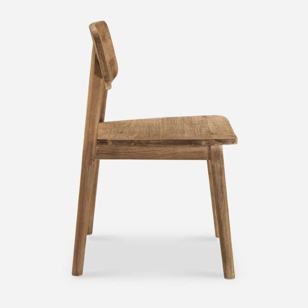 Side view of a solid Acacia wood dining chair, featuring a subtle honey tone.
