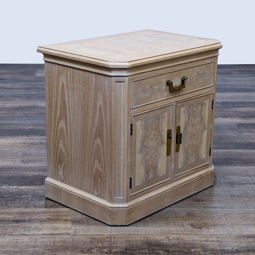 Side view of Corinthian bedside cabinet, burl ash wood design; includes upper drawer and two cabinet doors.
