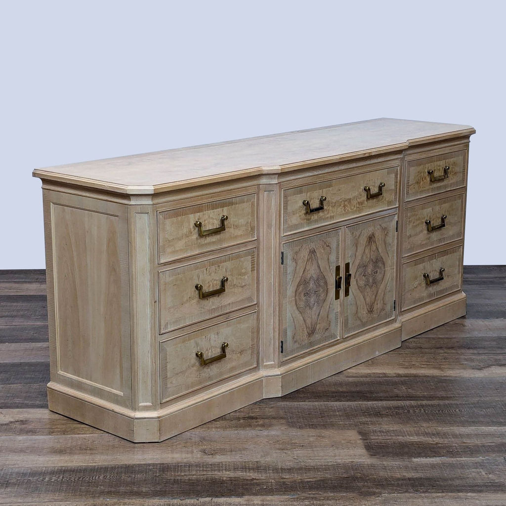 Side view of Drexel Heritage dresser in light wood finish with nine spacious drawers and central cabinets.