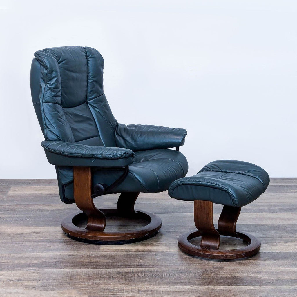 Side angle of blue Ekornes lounge chair and matching ottoman.