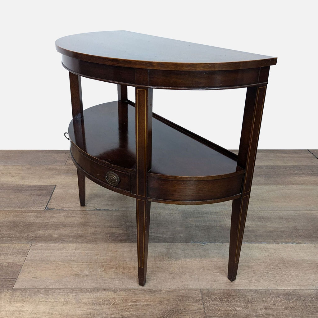 Brandt console table with curved design, two shelves, and drawer.