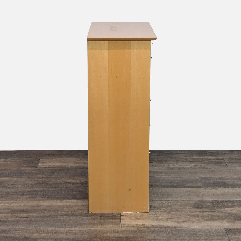 Side profile of wooden dresser, highlighting smooth surface and natural color.