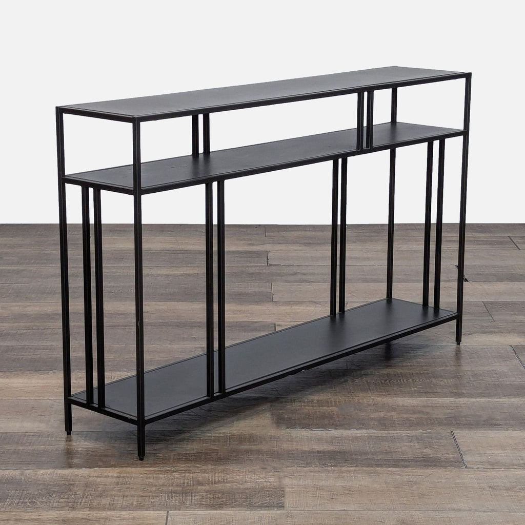 Side view of black Reperch console table showcasing metal frame.