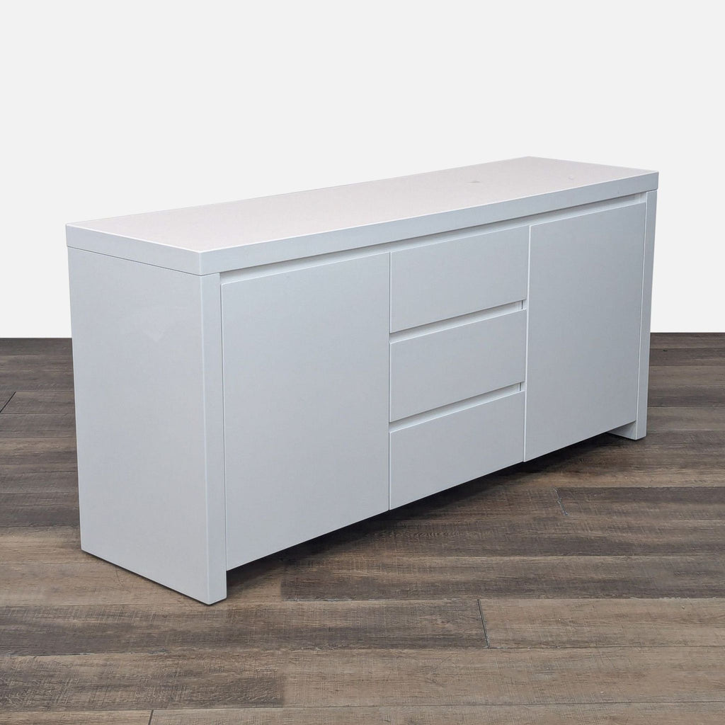 Angle view of white Reperch buffet with sleek design and ample storage.