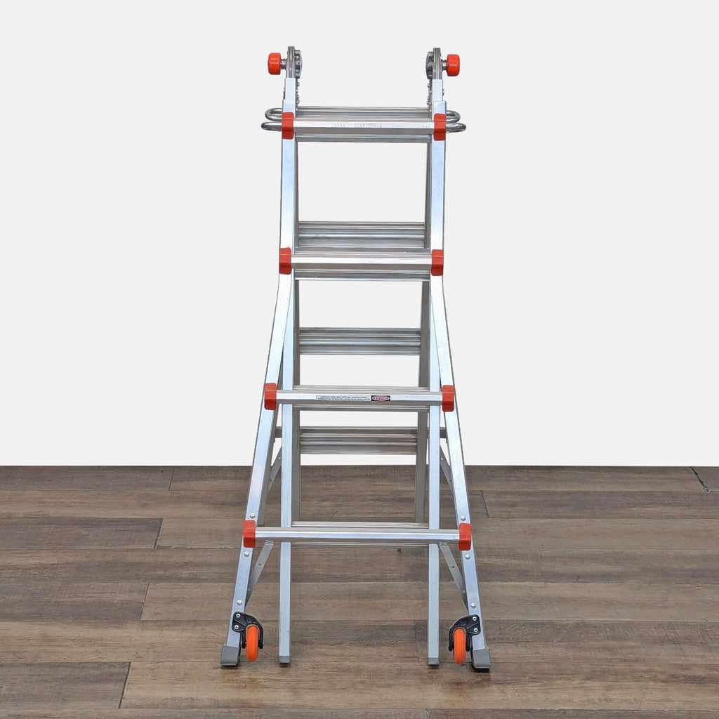 Front view of the versatile Megalite Aluminum Ladder, showcasing sturdy design and wheels.