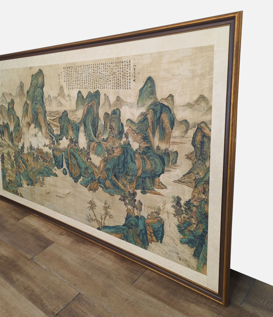 Side view of an expansive Chinese scroll with artistic mountain landscape, framed.