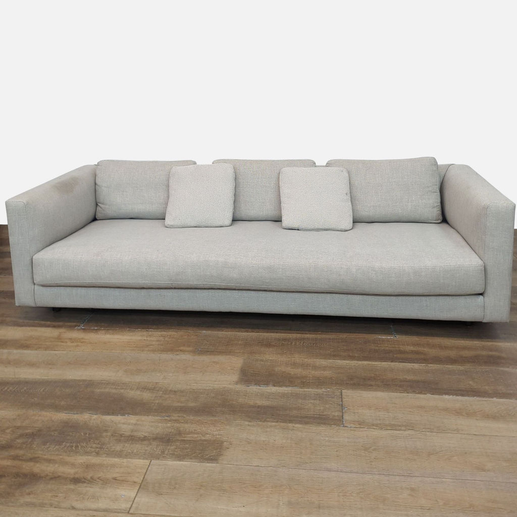 The Hands Down sofa by Blu Dot in Landa Stone fabric with track arms and a bench cushion.