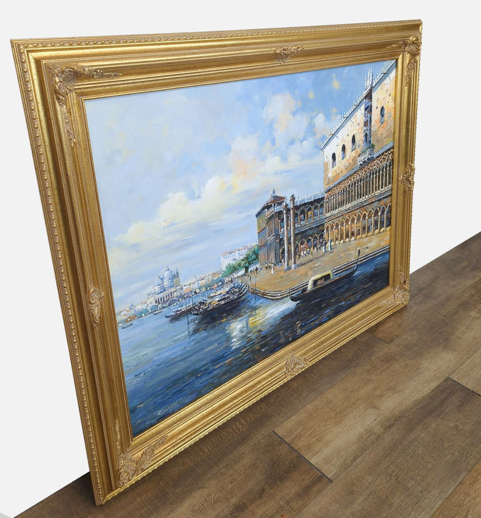 Side view of Venice oil painting in ornate frame, showcasing gondolas by the Doge Palace.