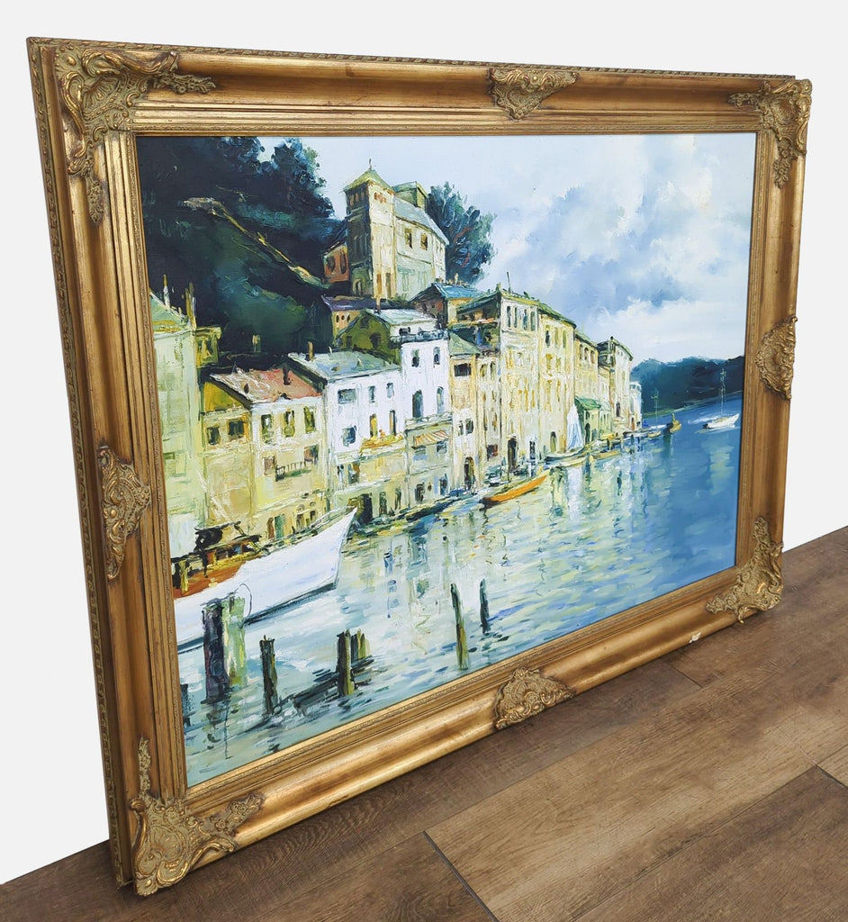 Reperch oil painting shows Portofino harbor, framed in gold.
