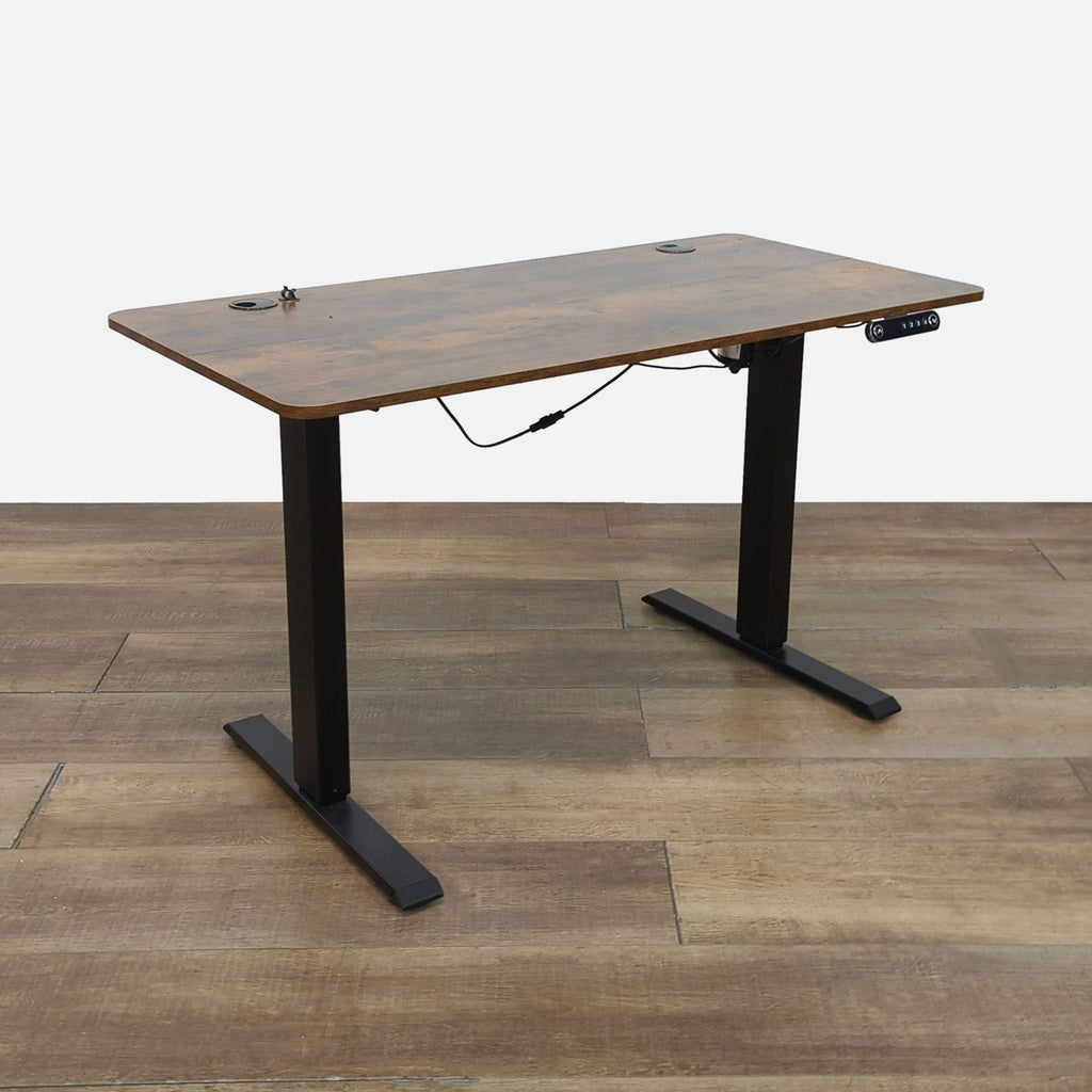 Adjustable standing desk with rustic wood top and black metal legs.  