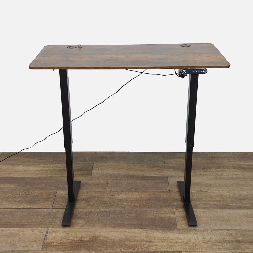 Reperch desk with height adjustment, featuring a wood veneer finish.  