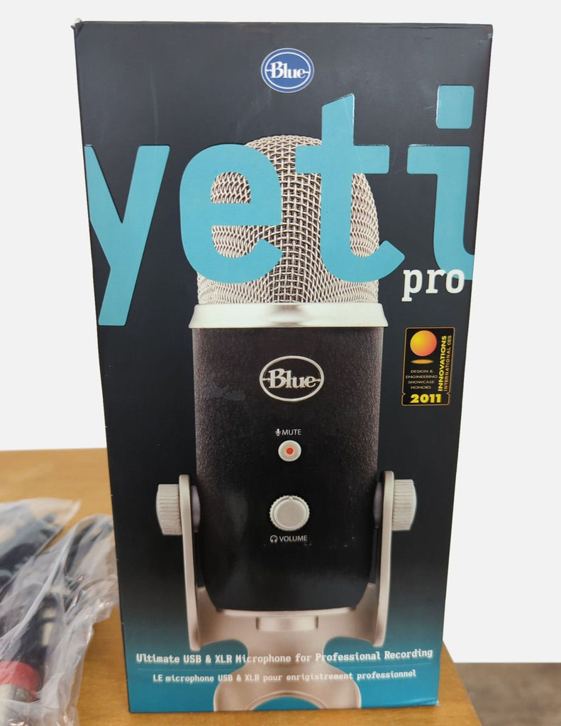 Packaging of the Blue Yeti Pro USB Microphone showcasing its features.