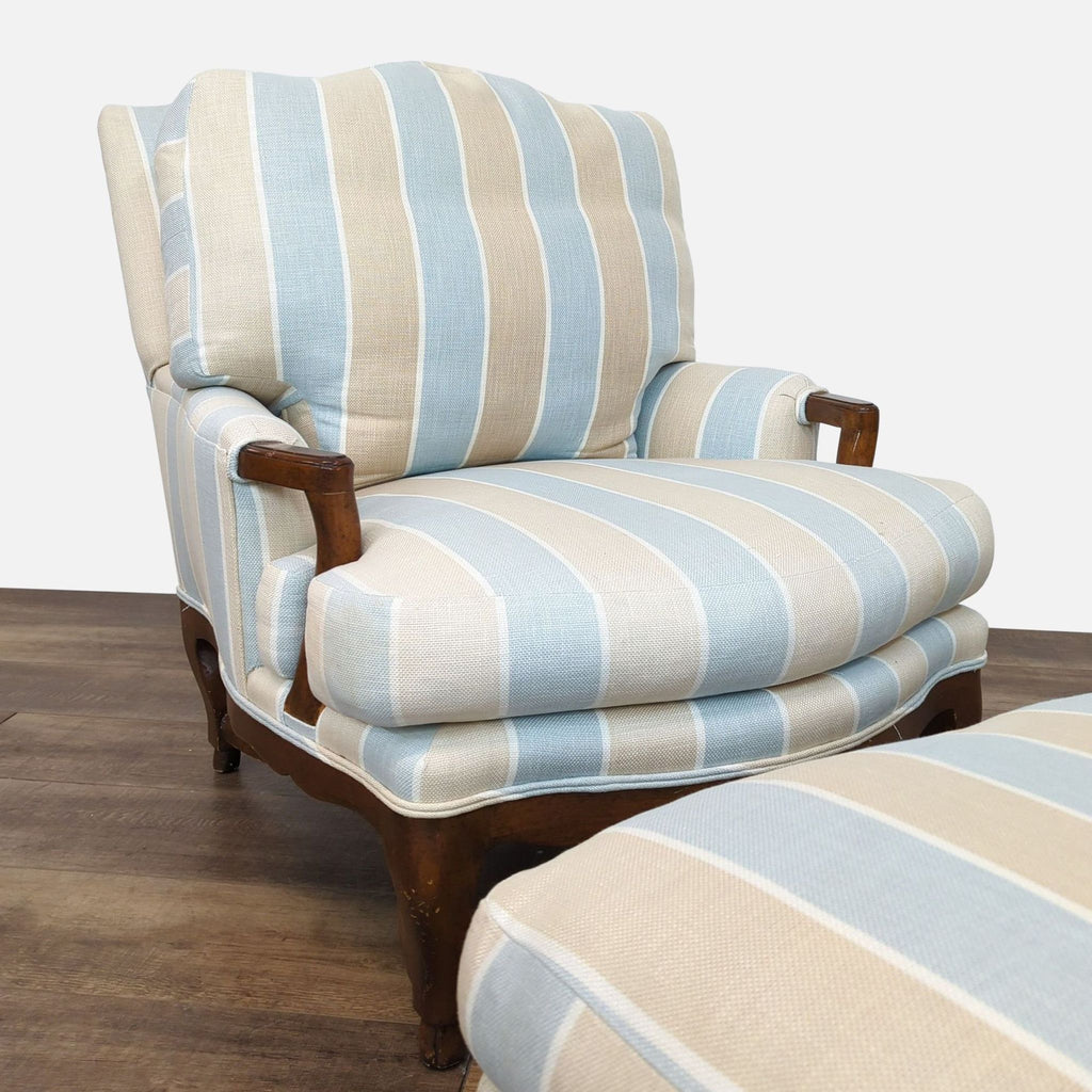 Close-up of a striped Reperch lounge chair featuring plush upholstery and wood details.