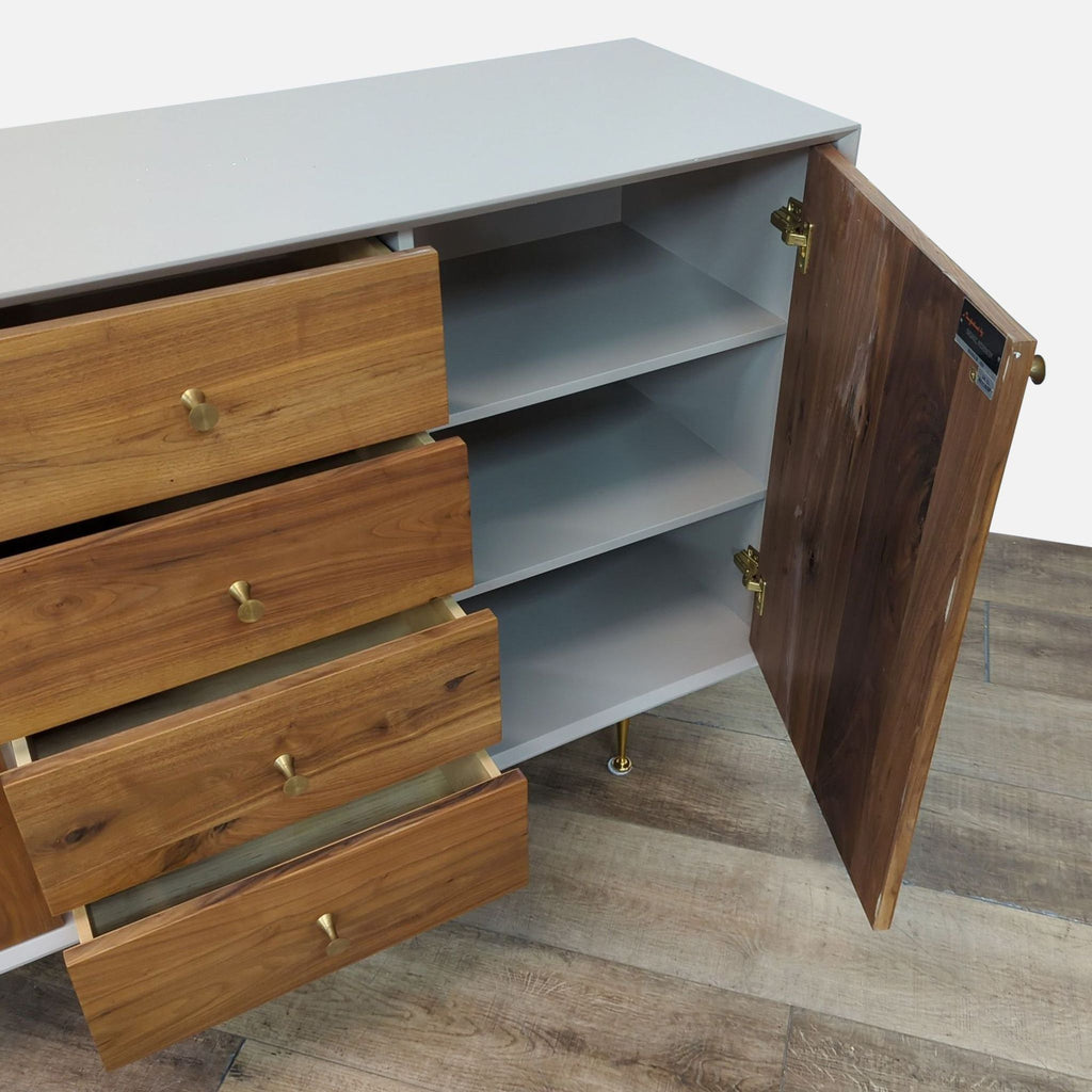 Open view of walnut and white lacquer credenza showing drawers and interior shelves.