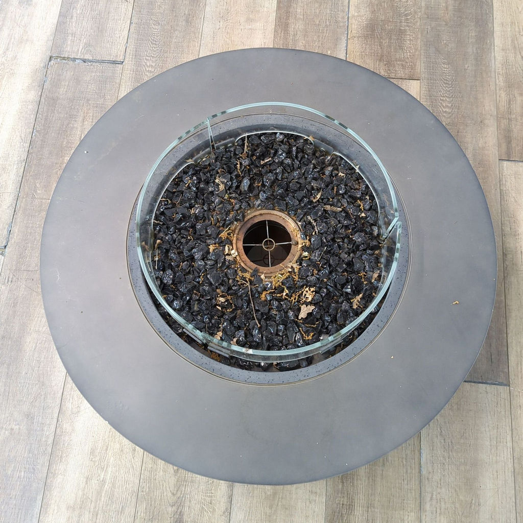 Top view of round EcoSmart fire pit with glass firescreen.