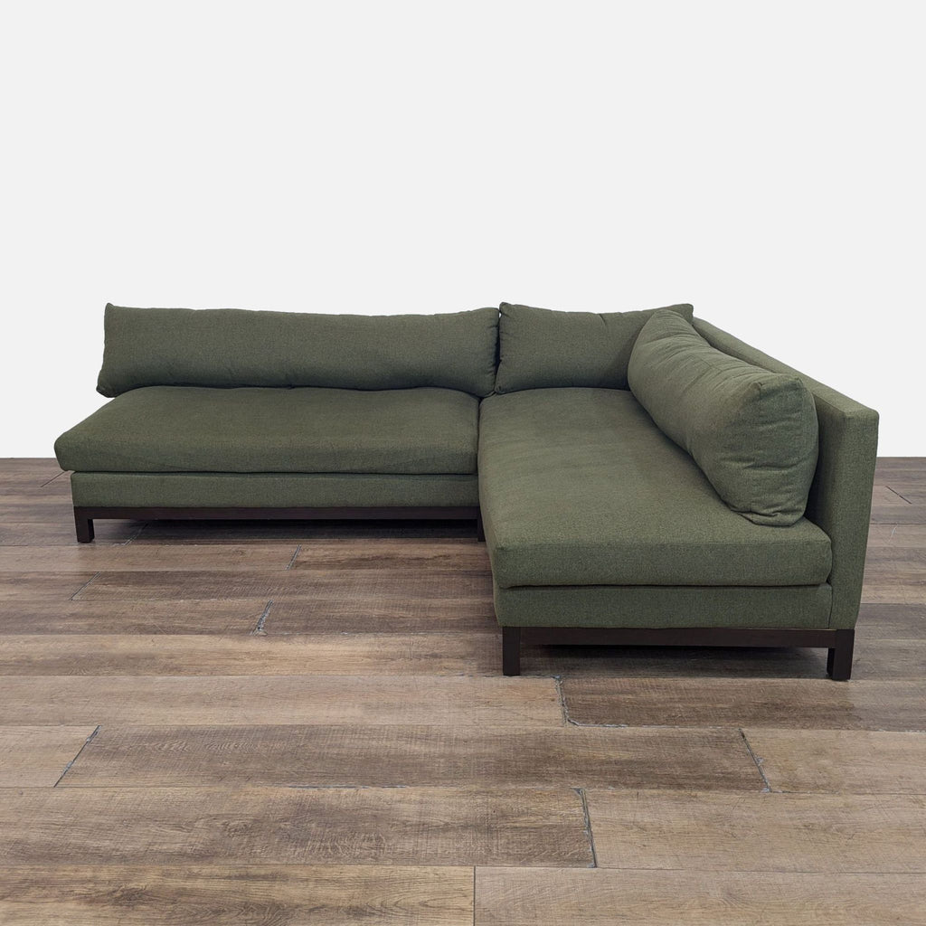 Olive green sectional with removable cushions and wood frame from Joybird.