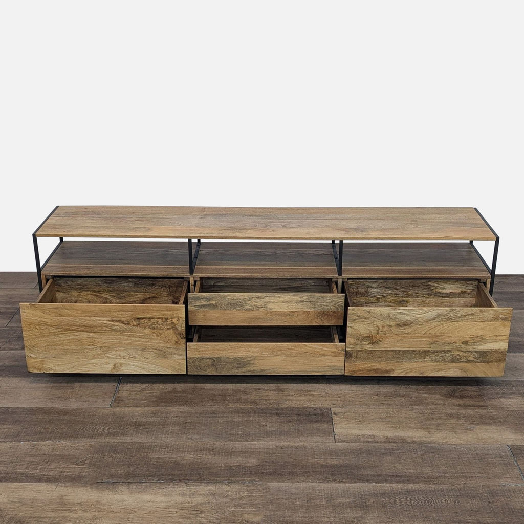 Entertainment center featuring open drawers, showcasing mango wood and steel design.