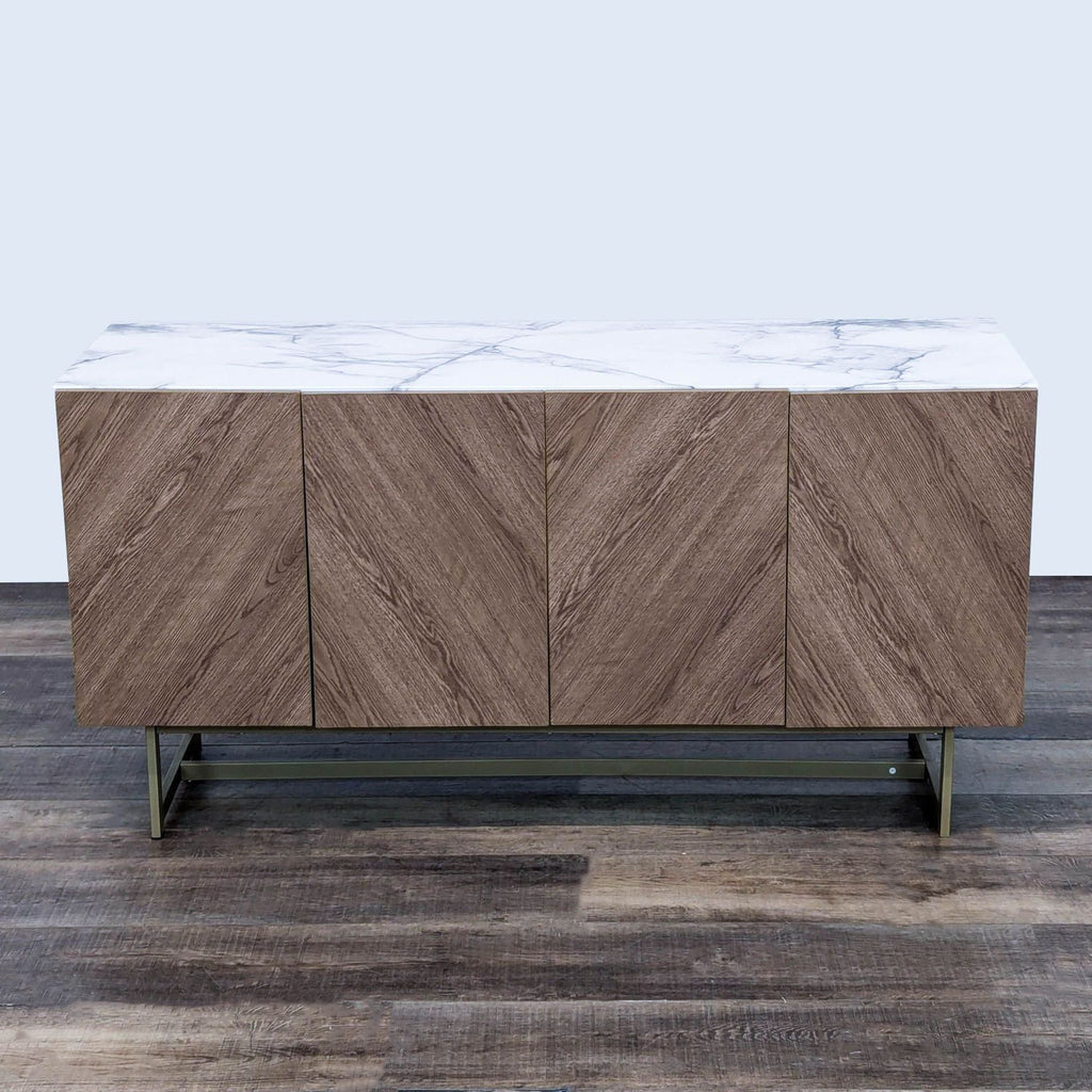 Reperch entertainment center with a marble top and wood-finish doors.