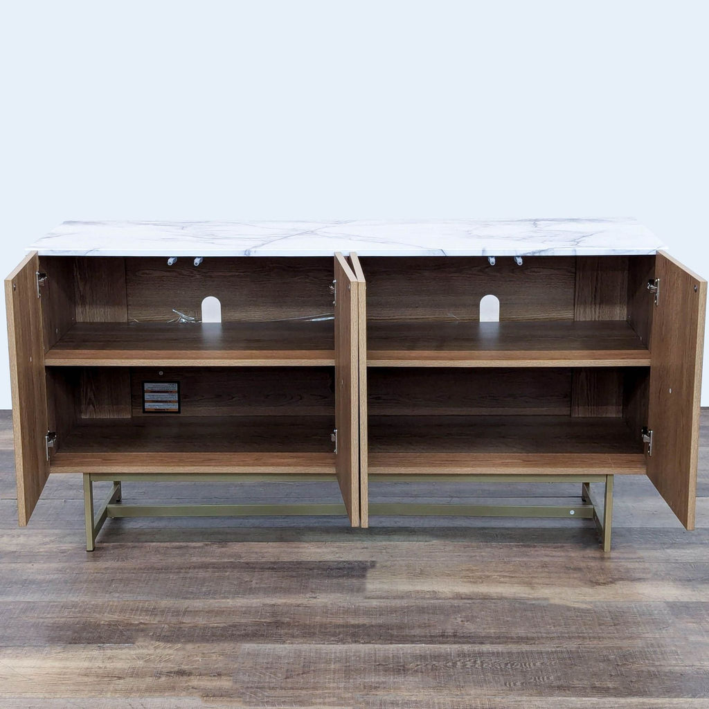 Entertainment center opened to show interior shelving and design.