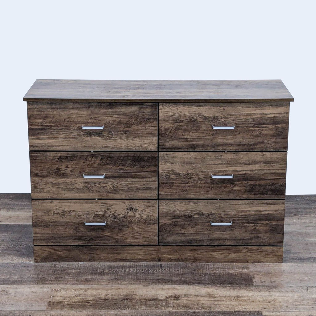 Synergy House dresser with 6 drawers and metal handles, made of engineered wood.