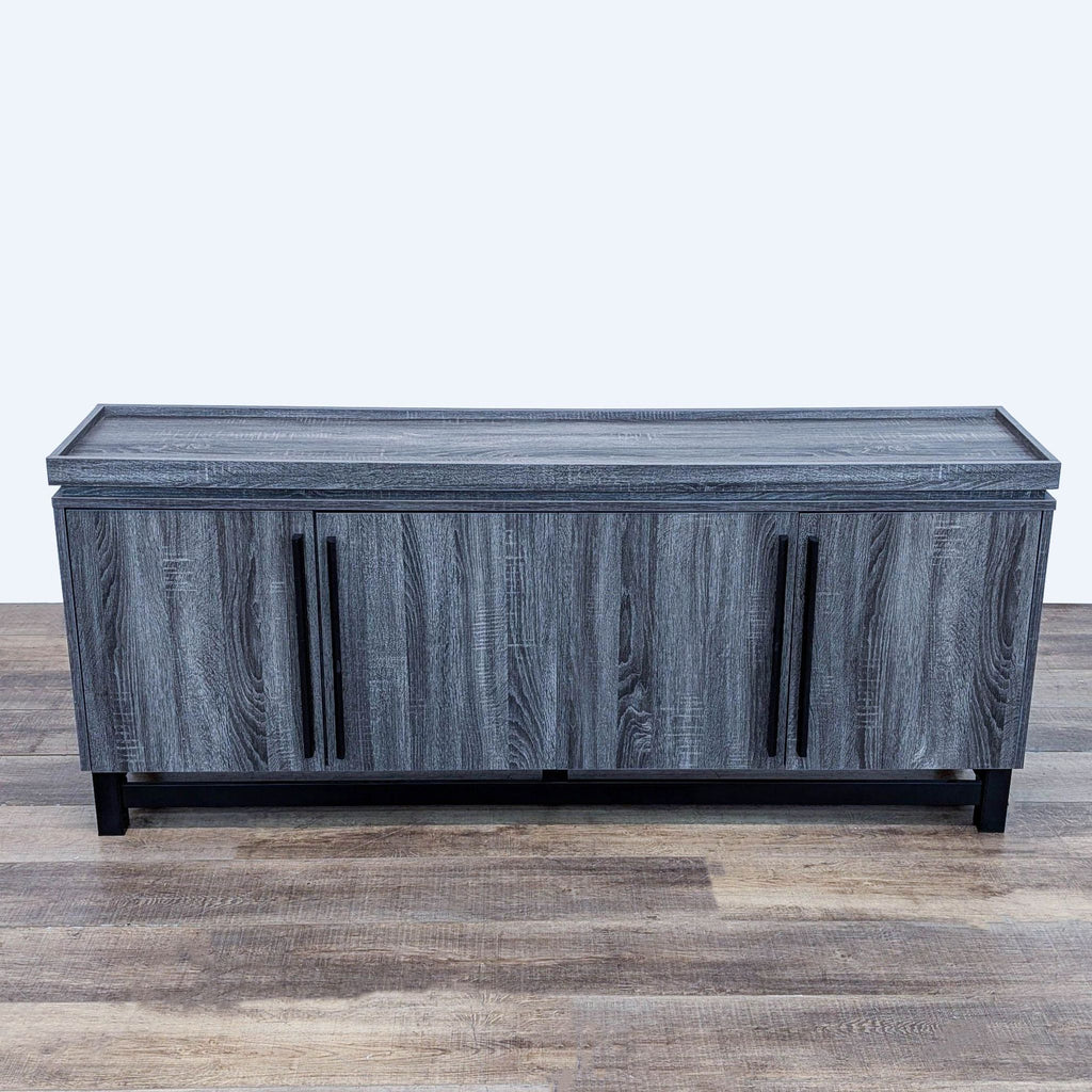 Reperch entertainment center with closed doors, featuring a gray wood grain finish.