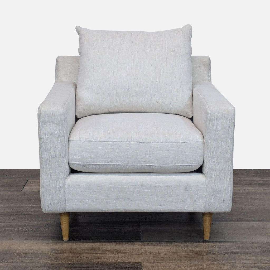 Front view of Sloan lounge chair with track arms and thick cushions.