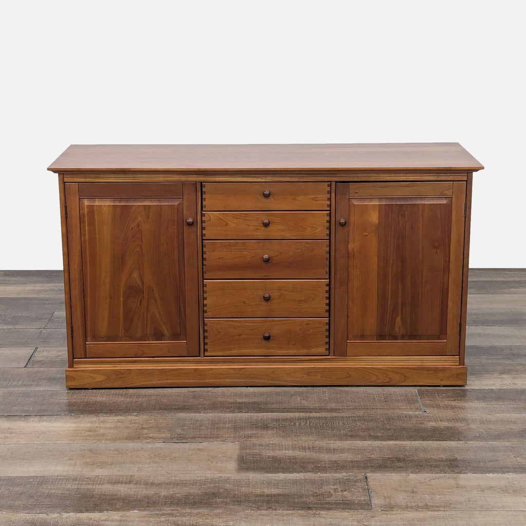 Classic wooden sideboard with two cabinets and five central drawers by Reperch.