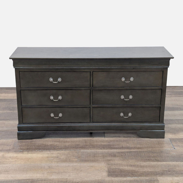 Classic dresser by Reperch with six drawers and nickel drop handles.