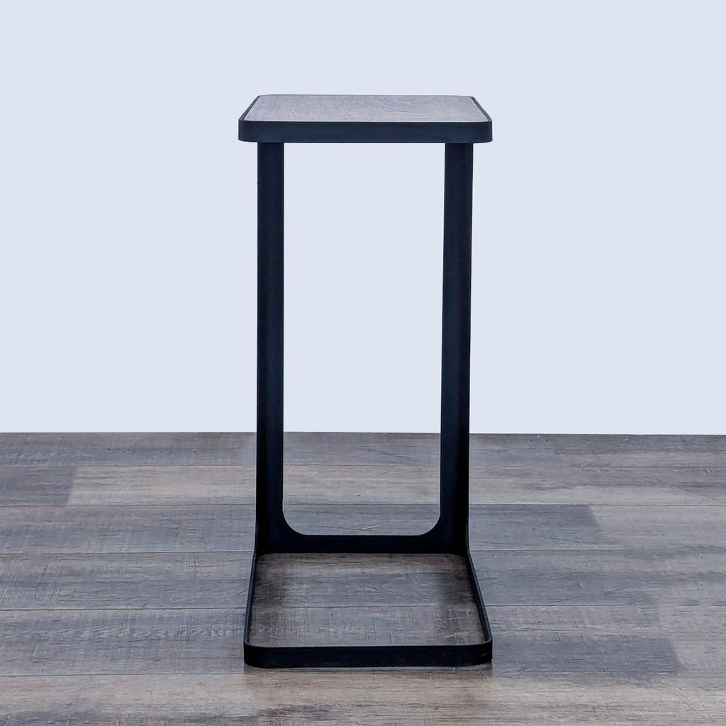 Sleek Yamazaki console table, wood surface on metal structure.
