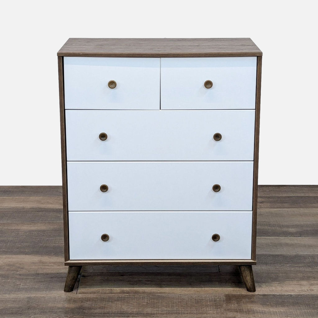 Front view of a South Shore Furniture dresser with 5 white drawers on wood.