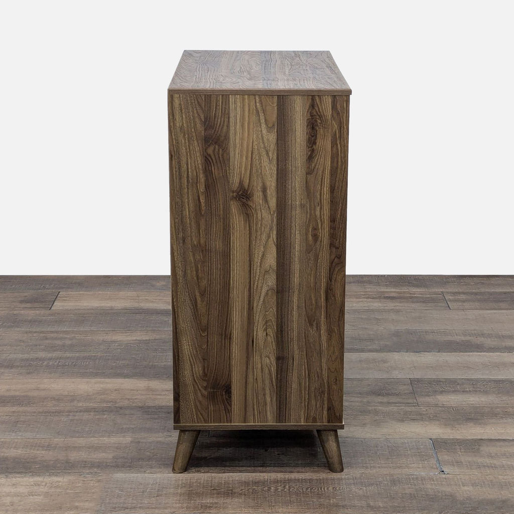 Wooden dresser showing wood grain texture and simple, modern design from the side.
