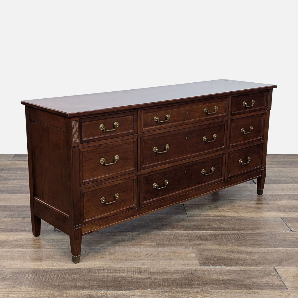 Elegant cherry dresser with brass handles and dovetail drawers from Reperch.