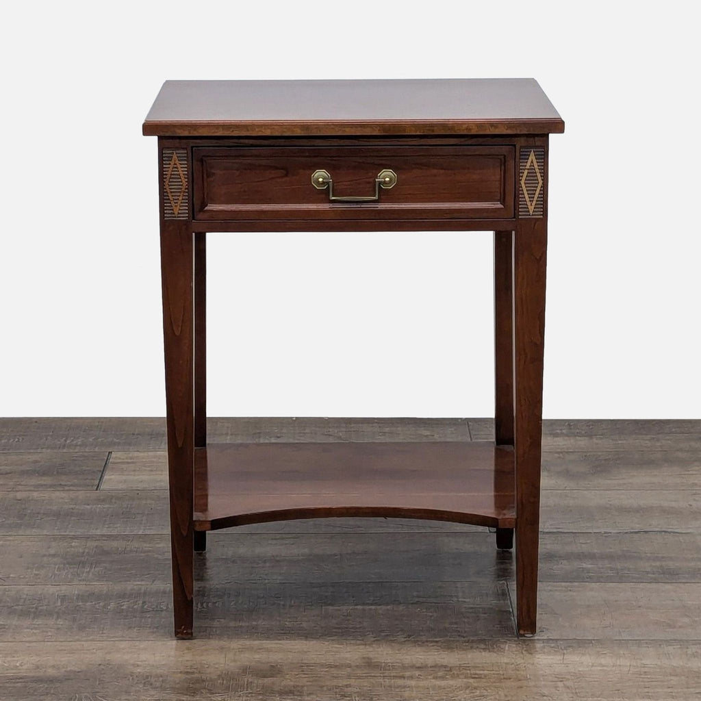 Stickley end table with a wooden frame and decorative diamond accents.