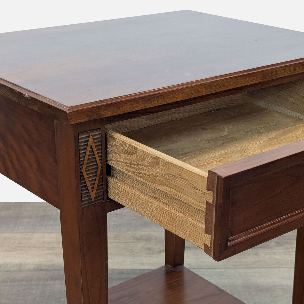 Close-up of the Stickley end table’s wooden drawer detail and craftsmanship.