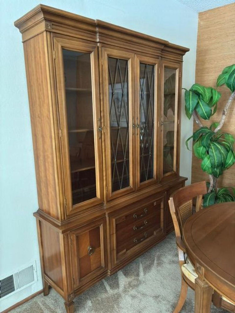 2. Classic wooden armoire from Thomasville featuring spacious shelves and a traditional, sturdy design.