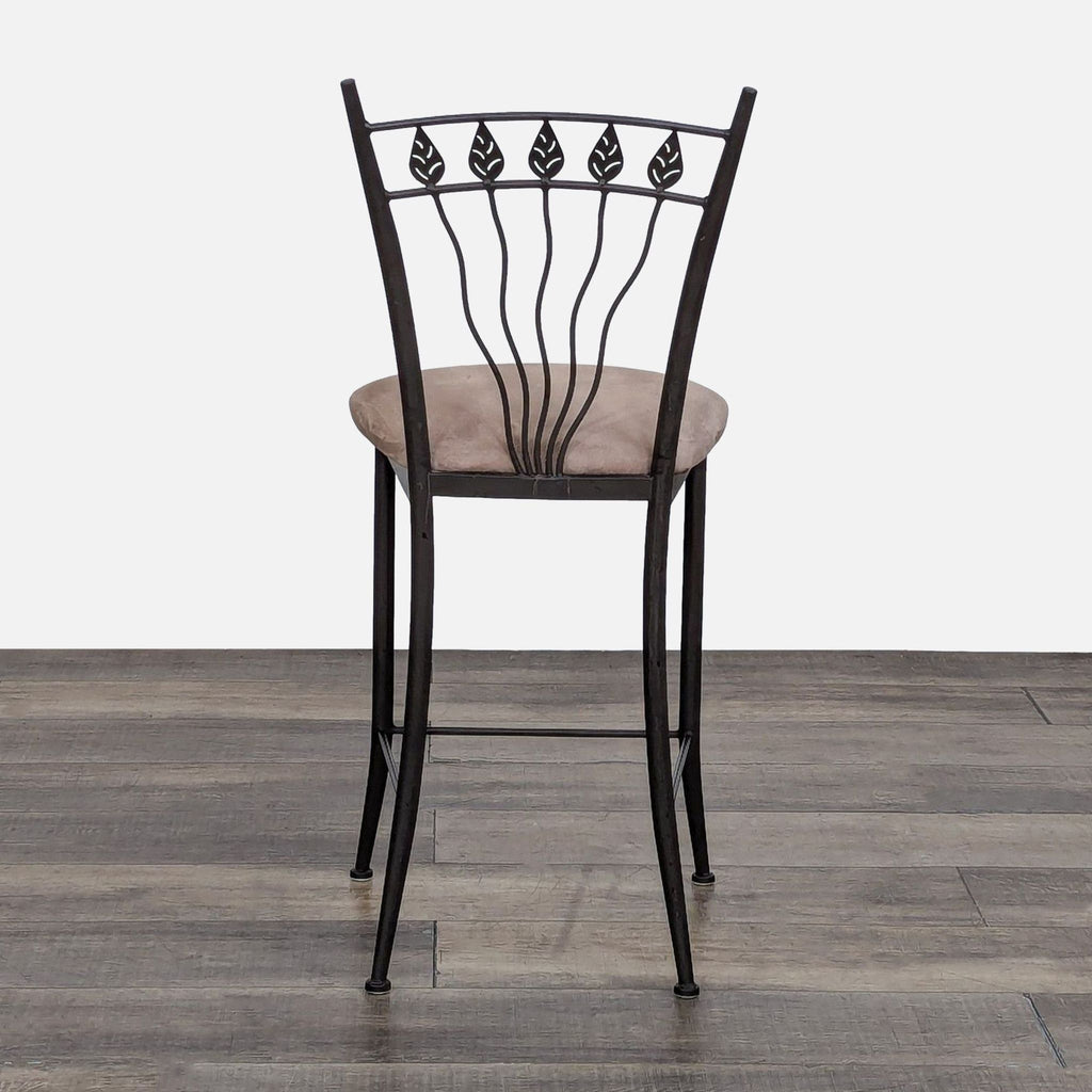 Side view of an iron stool featuring a cushioned seat and elegant backrest design. Gibo Inc.
