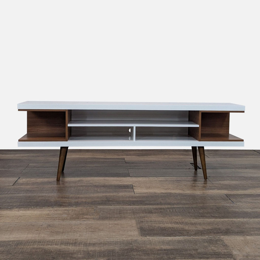 Mid-century modern entertainment center with splayed dowel legs.