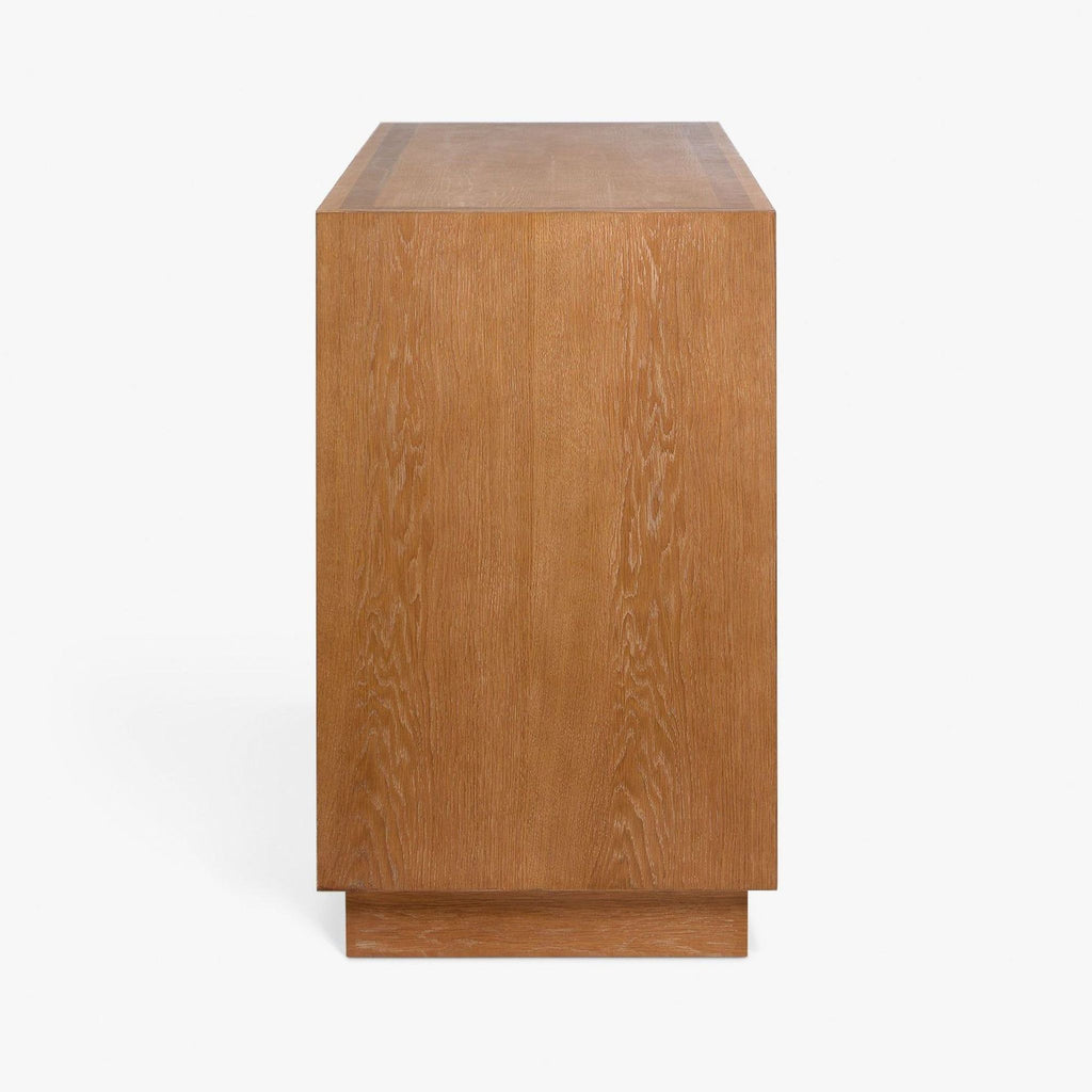 Angled view of the Brandt dresser showing open drawers with metal pulls.